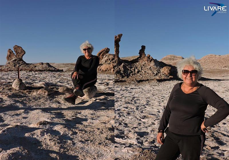 senhora em frente ao monumento três marias no deserto do atacama