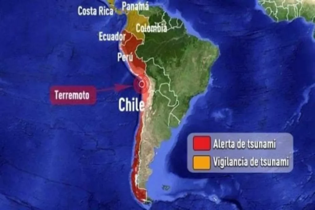 Mapa da América do Sul mostrando o Chile e países vizinhos com um círculo de terremoto e áreas de alerta de tsunami (vermelho) e vigilância de tsunami (laranja) ao longo da costa do Pacífico.